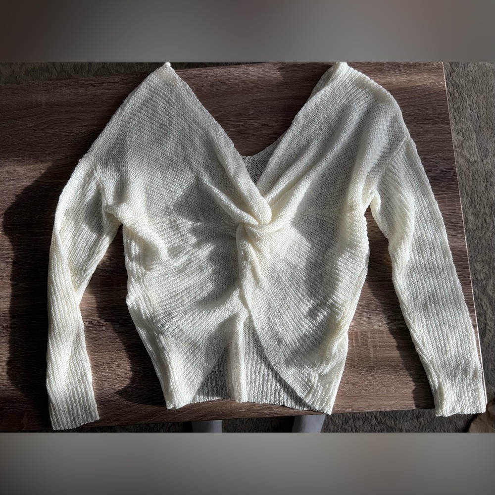 Off the shoulder, twist open back long sleeve sweater